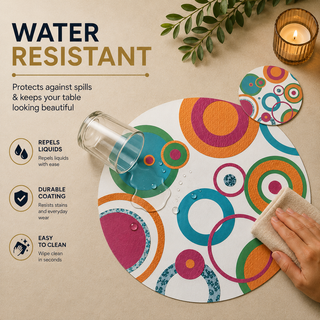 Concentric Pop round paper placemat, bold pop art concentric circles, water resistant surface with liquid beading as a hand wipes it clean, matching coaster alongside