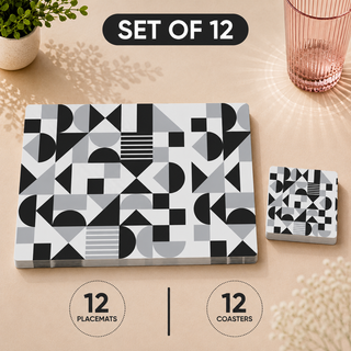 Monochrome Balance rectangular paper placemats and coasters set of 12, black and white Bauhaus geometric shapes, twelve placemats stacked beside twelve matching coasters