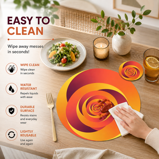 Golden Sunset round paper placemat, red orange and gold spiral swirl, easy to clean as a hand wipes a spill beside a styled place setting