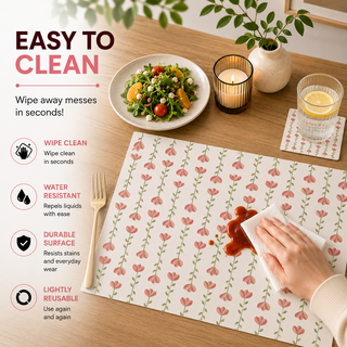Floral Trellis rectangular paper placemat, coral tulip trellis on white, easy to clean as a hand wipes a spill beside a styled place setting