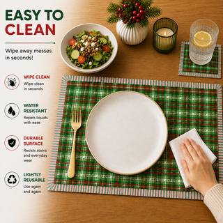 Holiday Threads rectangular paper placemat, green and white Christmas tartan plaid, easy to clean as a hand wipes a spill beside a styled place setting