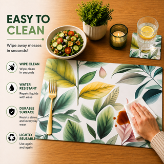 Pastel Foliage rectangular paper placemat, soft pastel green and pink leaves, easy to clean as a hand wipes a spill beside a styled place setting