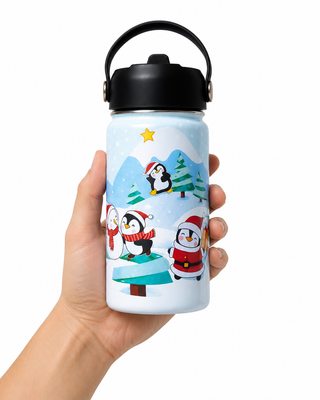 Hand holding the Snowy Penguins decorated kids water bottle, 14oz BPA free stainless steel