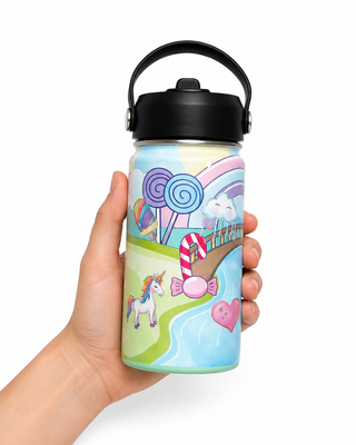Hand holding the Magic Meadows decorated kids water bottle, 14oz BPA free stainless steel