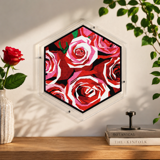 Rose Garden hangable acrylic wall art puzzle mounted on the wall above a shelf